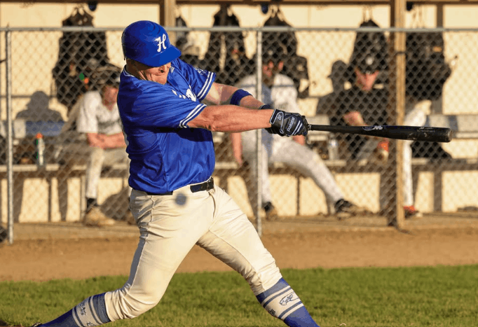 Hamel Hawks player Matt Kramer singles to right field. photo credit: Koko Yoko Photography
